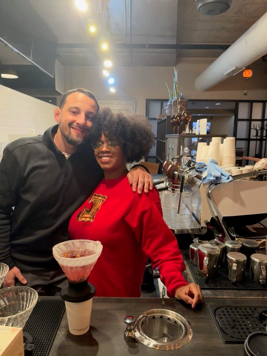 Leo and Brittani behind the espresso bar at Dream Chasers Coffee
